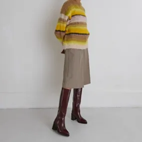 Boots with laminated heels in brown leather