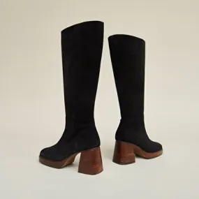 Platform boots in black suede